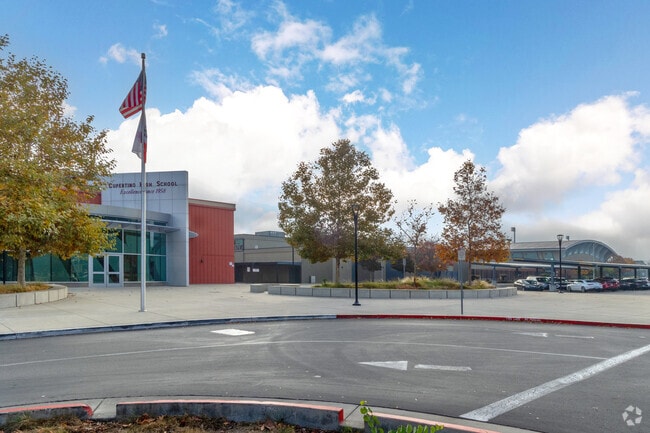 A view of the Cupertino High School buildings from the street.
