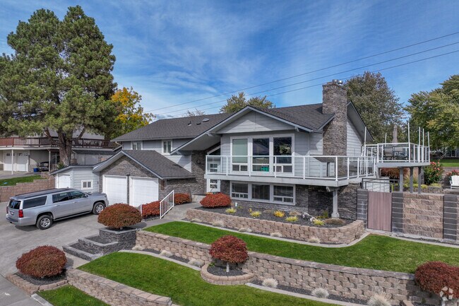 Modern homes with tiered landscaping showcase Meadow Springs’ charm.