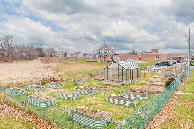 Locals tend to the garden at Barth Elementary School.