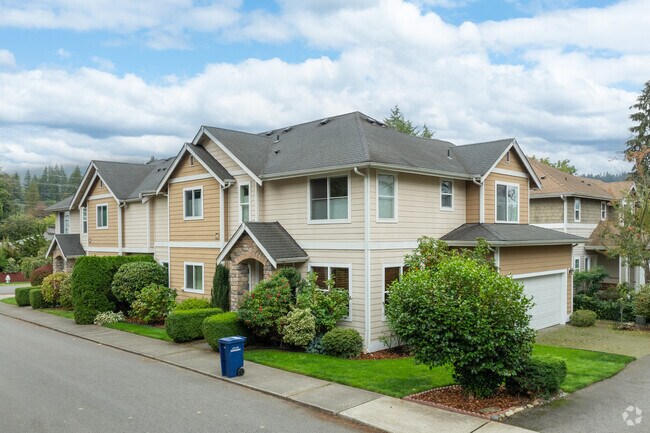 Throughout the Olde Town neighborhood, there are several condo buildings.