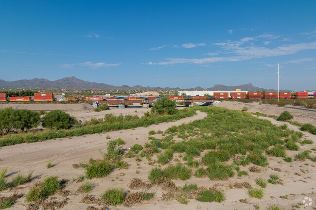 The typically dry Rillito River cuts through Benan Venture.