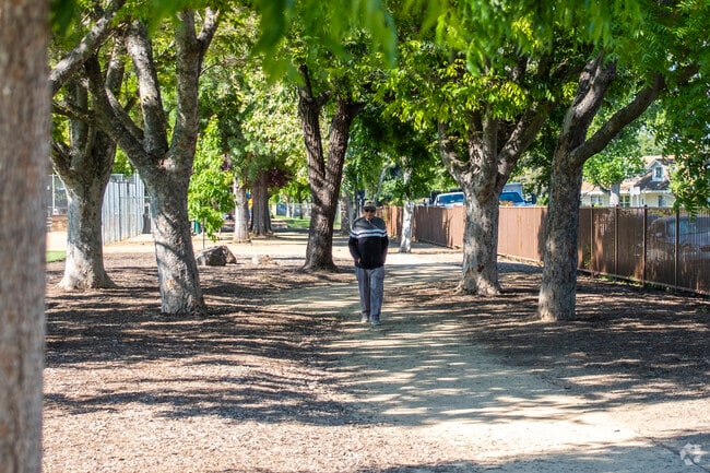 A man walking in El Quito Park in the Bucknall area.