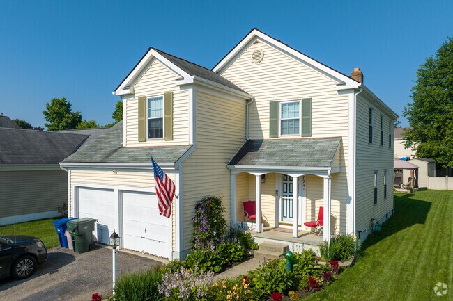 A lovable colonial style home in the Village at Worthington.