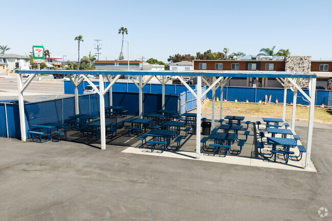 Sit outside by the lunch areas at the Surfside Academy in Downtown Oceanside, CA.