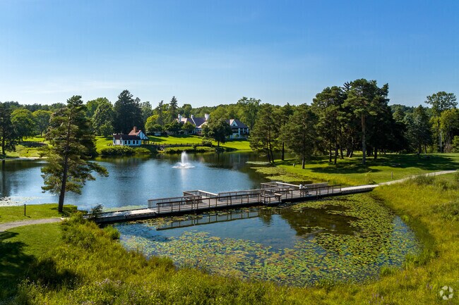 Take a stroll through Addison Oaks County Park with its scenic trails and recreation areas.