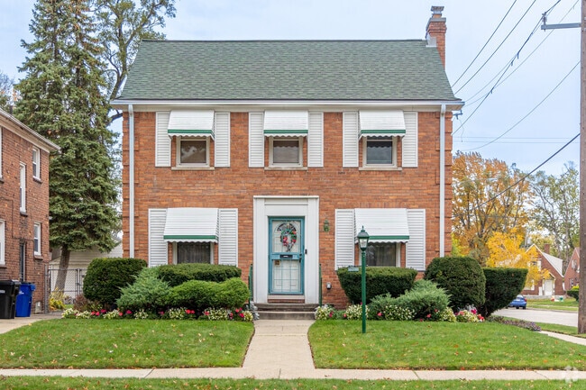A brick single-family Colonial Revival home in the Hubbell-Puritan neighborhood.