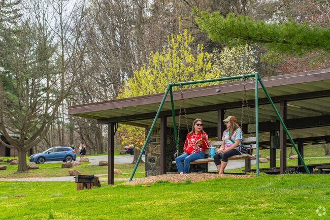 Friends gather to relax in the calming atmosphere of Shillington Park.