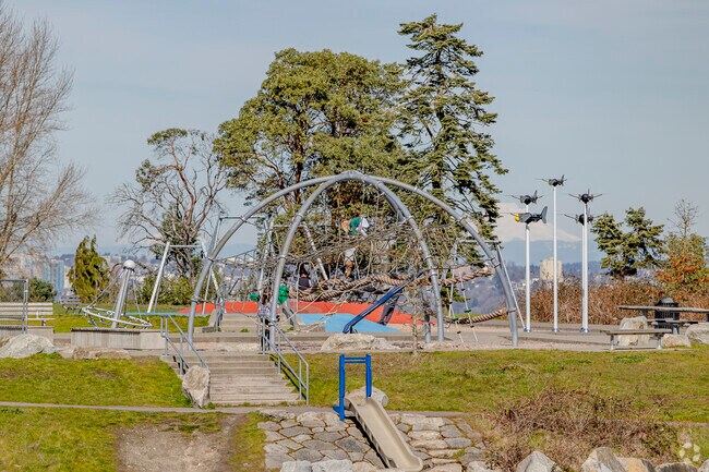 Children play on the jungle gym at Westcrest Park in Highland Park.