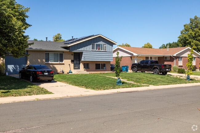 Looking down the street in Chambers Heights shows split level and ranch style homes.
