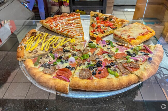 Enjoy a variety of specialty pizzas from Nino and Sons in Hillside.