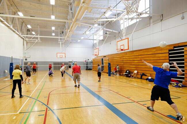 Echo Lake locals compete in a pick-up game of volleyball at the Spartan Recreation Center.