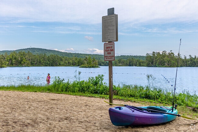 Residents of Sanbornton go to Hermit Lake Beach for a swim or a kayak ride.