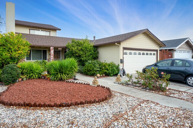 There are many beautiful gardens in the Homeview neighborhood.