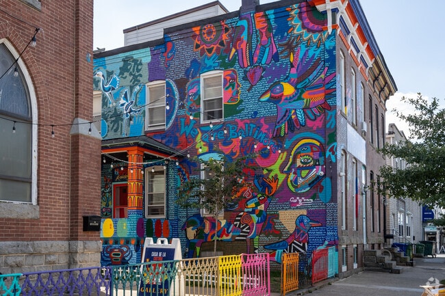 Murals brighten Highlandtown blocks, celebrating immigrant roots and art.