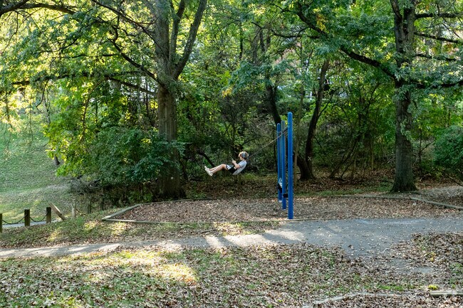 Kids enjoy the swings at Koch Park near Churchill