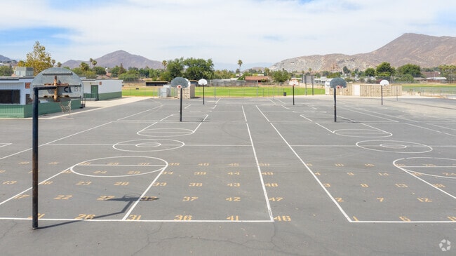 The paved outdoor area allows students to get fresh air and play basketball at Rubidoux High.