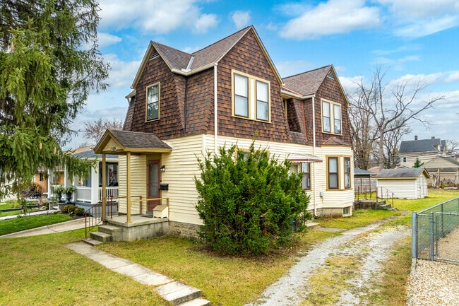 Dutch Revival homes appear frequently along tree-lined streets.