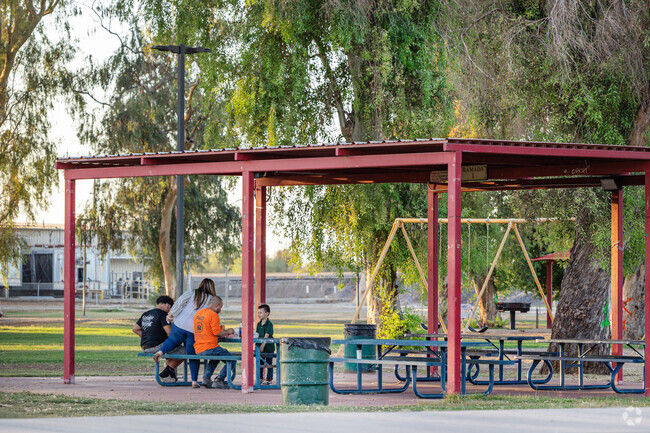 Joe Henry Memorial Park in Yuma offers a peaceful retreat with shaded picnic areas and open green spaces.