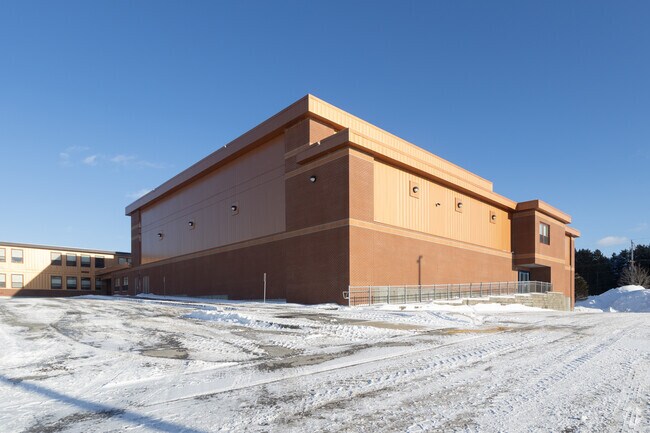 Presque Isle Middle School serves the local community by providing a crucial bridge between elementary and high school, fostering academic growth and social development during the formative middle school years.