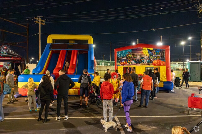 Kids can enjoy attractions like bouncy castles and slides at Lansdale First Fridays.