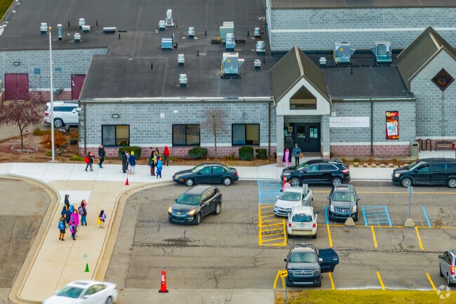 A wide front drive at Rawsonville Elementary makes student pickups and dropoffs easy for parents