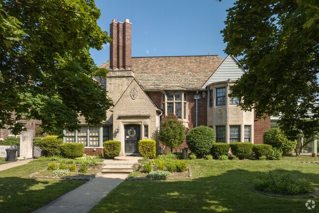 Large brick Tudor homes with lush landscaping are common in North End.