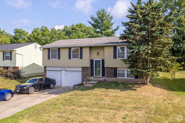 This raised ranch in Northbrook includes a two-car garage and spacious layout.