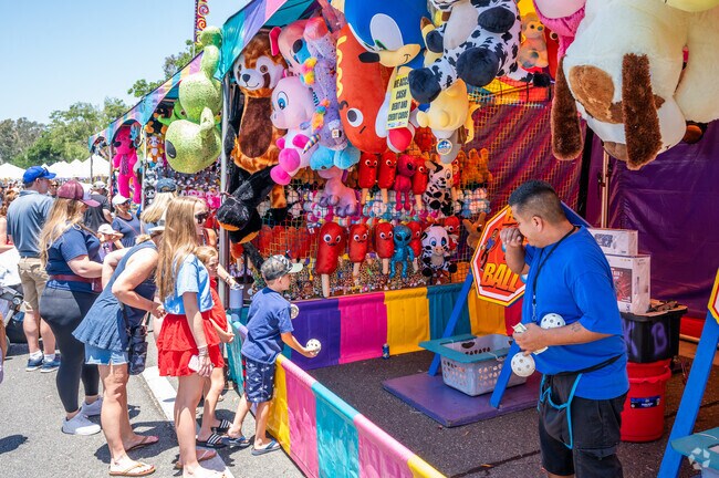 The carnival rides, food and games of the July 4th Street Faire are a special treat for Marina Hills residents.