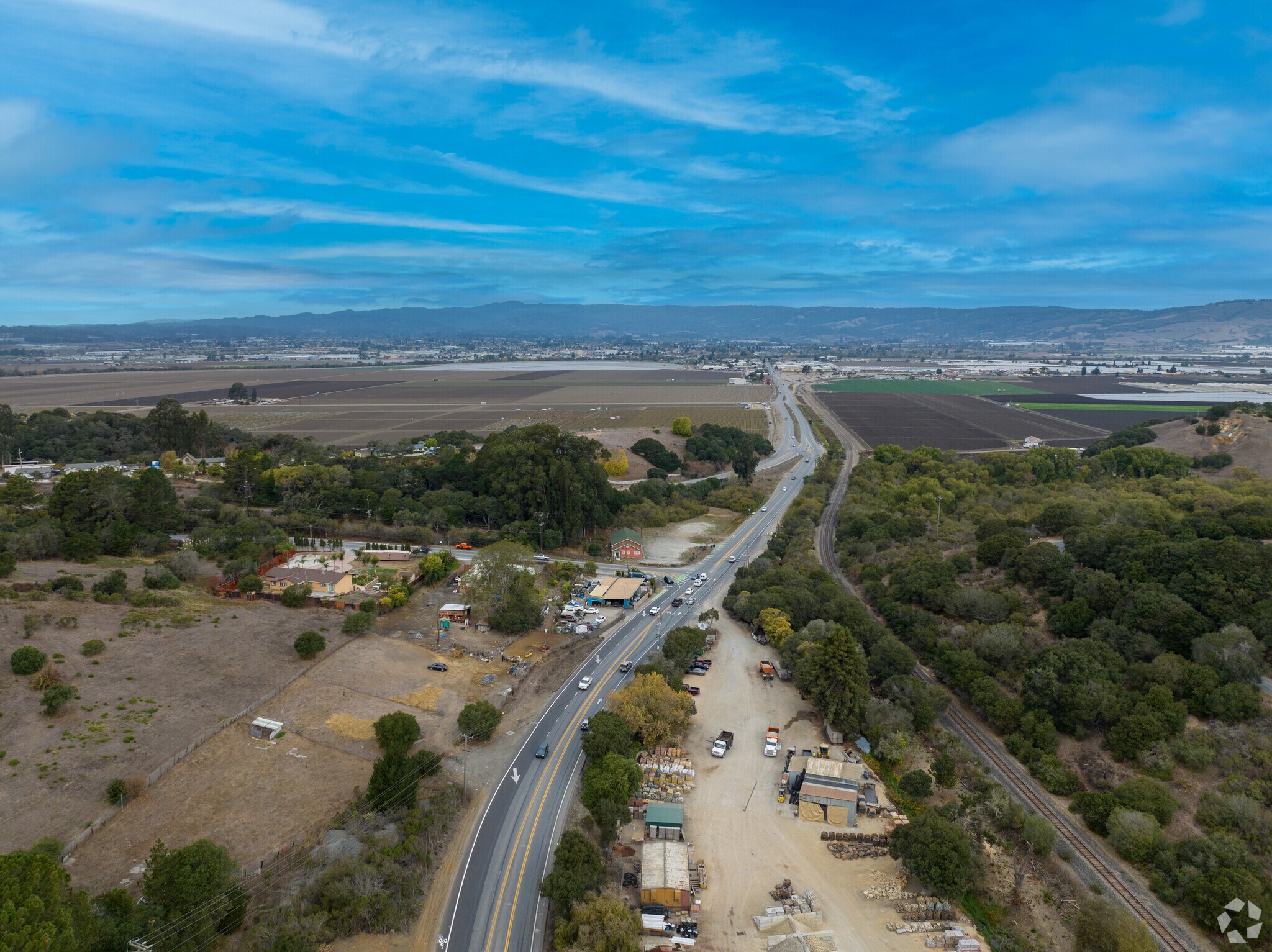 Stretching into the horizon, the long road beckons towards Pjaaro neighborhood.