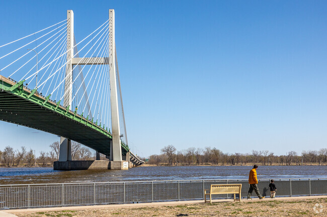 The Burlington riverfront offers scenic and tranquil views of the Mississippi River and the Great River Bridge.