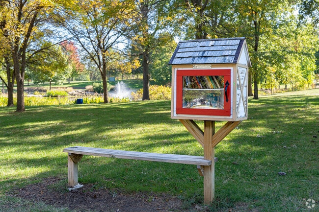 Relax on this bench with a book from the Little Free Library in St. Ann.