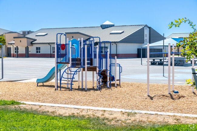 Kids enjoy the playground jungle gym at the Orchard Ranch Elementary School in Lincoln, CA.