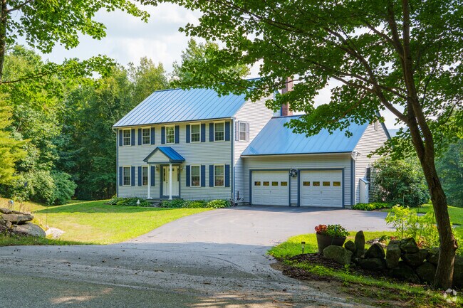 Some homes in Andover have steel roofing for snowy winters.