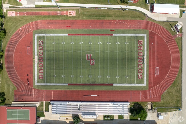The Broncos logo marks the center of Union Grove High School’s football field.