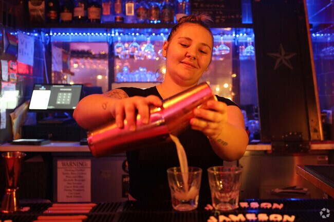 A Rebel Kitchen bartender crafts a Shot with skill, adding to Livermore's vibrant nightlife.