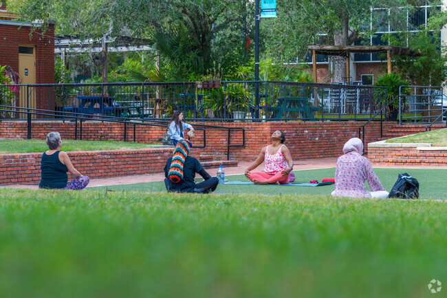 Relax and recharge with yoga near Ridgeview at Bo Diddley Plaza.