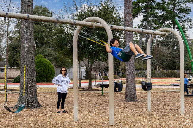 A mother and son enjoy an afternoon at Shenandoah City Park.