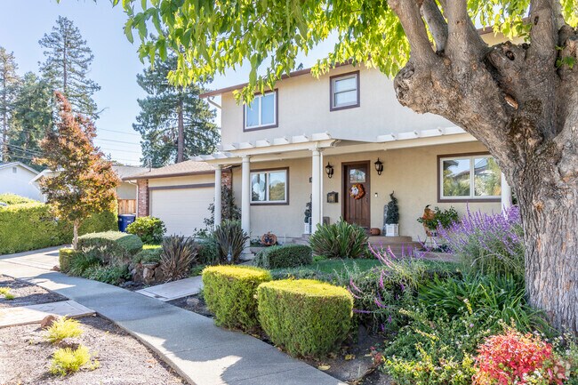Beautifully landscaped front yards are ever present in Monument Corridor.