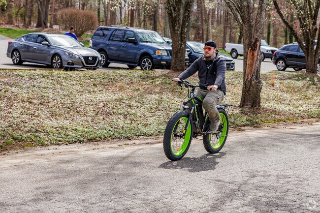 A Hilltop resident enjoys riding his fat tire bike on a warm afternoon.