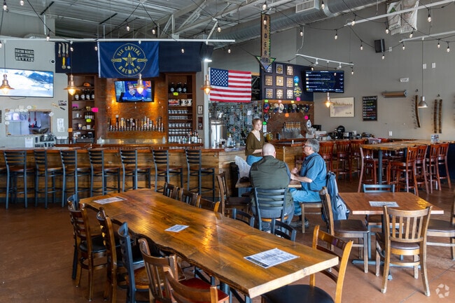 Grab a beer and some BBQ at Six Capital Brewing in Aurora Highlands.