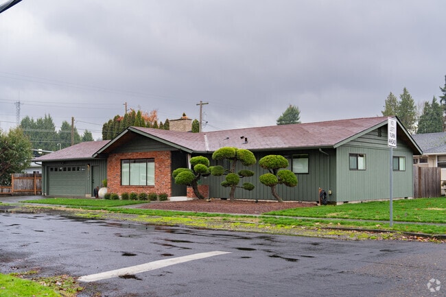 A midcentury home reflects classic design in Olympic East.