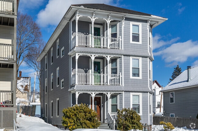 Beautiful historic details can be seen on many triple deckers around Beacon Brightly.