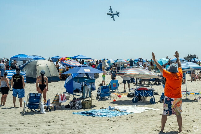 Claim your spot on the beach as the US Navy's Fat Albert C130 thunders overhead.