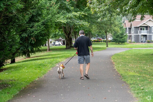 Residents of Ellsworth Springs neighborhood enjoy walks in the park.