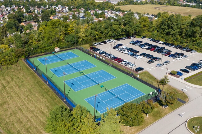 The tennis courts at Canon McMillan High School reflect Lawrence’s commitment to youth athletics and community engagement.