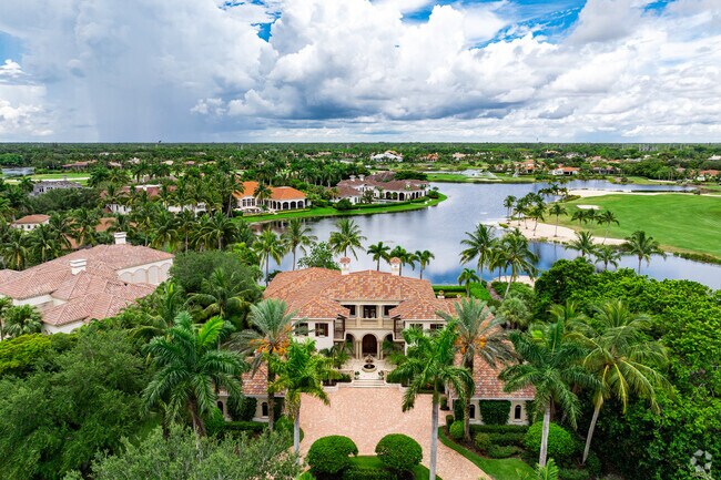 Palatial Spanish-revival homes sit along scenic lakes in Grey Oaks.