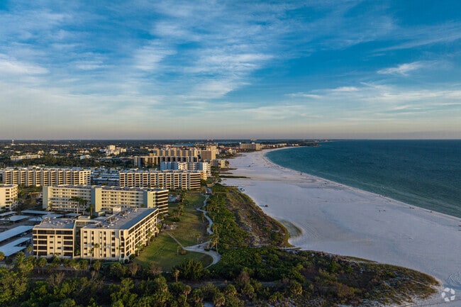 Beachfront condos and homes line the coast of Siesta Key, offering scenic living options.