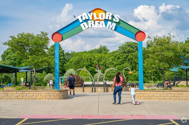 Countrybrook children head to Taylor's Dream playground in Kreager Park.