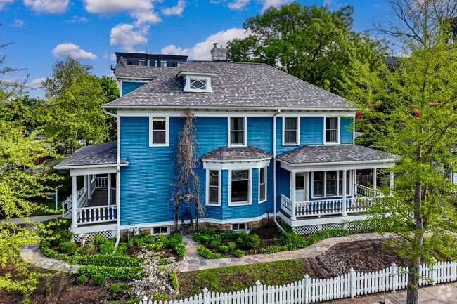 Prairie-style homes with accented porches line the streets of East Bde Maka Ska.