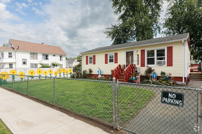 Beautiful single family and two family homes lines Brightwood streets
